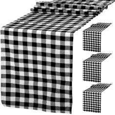 black and white checkered table cloths with matching napkin holders on each side, set against a white background