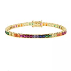 A special gift to yourself and others! 14k Gold Plated Multi Colored Square Cubic Zirconia Tennis Bracelet. Rainbow Tennis CZ Bracelet To keep the color lasting longer: - Do not wear it to the pool, spa, or the beach - Remove when sleeping, exercising, or doing other physically strenuous activities - Avoid contact with perfumes, body oils, and other chemicals, including household cleaners. - Do not use chemical jewelry cleaners - Store your beloved jewelry in a cool dry place All domestic orders shipping is FREE. Multicolor Cubic Zirconia Tennis Bracelet Gift, Luxury Multicolor Gold Bracelet For Gift, Luxury Multicolor Gold Bracelet As A Gift, Luxury Multicolor Gold Bracelet As Gift, Elegant Multicolor Tennis Bracelet As A Gift, Luxury Multicolor Tennis Bracelet As Gift, Rainbow Cubic Zirconia Bracelets For Gift, Rainbow Cubic Zirconia Bracelets As Gift, Rainbow Cubic Zirconia Bracelet For Gift