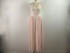 "Vintage 1940s pink dressing gown, lingerie. Made of Acetate/Nylon. Bias cut with white lace trim and sheer cups. Label:Elysee 54. About a size small/medium, C cup . Actual measurements are: about 37\" around the bust 30\" around the waist 47\" around hips 56\" overall length In excellent unused condition, New Old Stock." Pink Dressing Gown, Pink Gowns, 1940s Dresses, Vintage Lingerie, Backless Dress Formal, Women Lingerie, White Lace, Lace Trim, Gowns Dresses