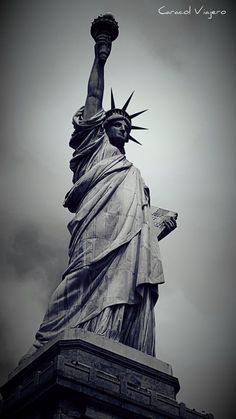 the statue of liberty is shown in black and white