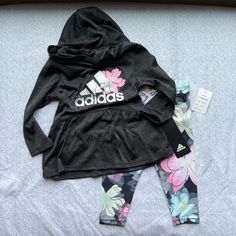 Size 12 Months. New With Tags Attached. Top Is 100% Polyester, Bottoms Are 92% Polyester And 8% Elastane. Comes From A Smoke Free, Pet Friendly Home. Ships In 1-2 Business Days. Black Spring Playwear Tops, Adidas Casual Tops For Playwear, Casual Adidas Tops For Playwear, Casual Adidas Sets For Spring, Black Top For Playtime In Spring, Black Tops For Playtime In Spring, Playful Black Sets For Spring, Playful Black Spring Sets, Cute Black Playwear Sets