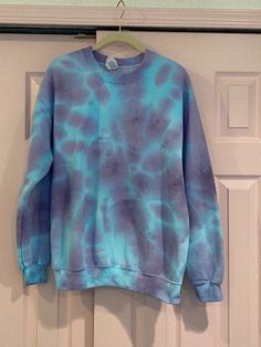 The perfect cozy tie-dye sweatshirt! 50% Cotton/50% Polyester. Size medium. Tie-dye Long Sleeve Sweatshirt For Spring, Tie Dye Sweatshirt For Spring, Tie Dye Long Sleeve Sweatshirt For Spring, Long Sleeve Tie Dye Sweatshirt For Spring, Spring Tie Dye Relaxed Fit Sweatshirt, Trendy Tie-dye Sweatshirt For Winter, Trendy Tie Dye Sweatshirt For Winter, Hand Dyed Cotton Sweatshirt With Relaxed Fit, Oversized Tie-dye Sweatshirt