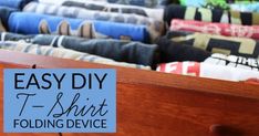 an easy diy t - shirt folding device with text overlay that reads easy diy t - shirt folding device