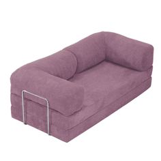 a purple couch that is sitting on top of a white surface and has metal legs