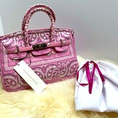 Nwt Veronica Beard Adorable. Pink Bandana Paisley Print W Silver-Tone Hardware Mini Satchel/ Tote And Strap. She Is Cute And Sassy! Her Opening Mimics The Original Berkin Bag Opening And Closure. Her Strap Is Still Wrapped And Lining Is Pink As Well. New Unused With Tags. Please See All Photos And Video Before Purchasing Or Bidding For Sizes And Call Outs If Noted. Sample Product For Summer Bag ( Possible 2023) And Dust Bag. Now Very Rare. Chic Pink Bags With Snap Closure, Pink Bags With Snap Closure, Pink Bandana, Summer Bag, Satchel Tote, Pink Mini, Veronica Beard, Paisley Print, Very Rare