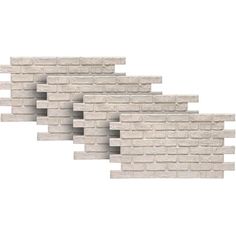 three pieces of white brick sitting next to each other