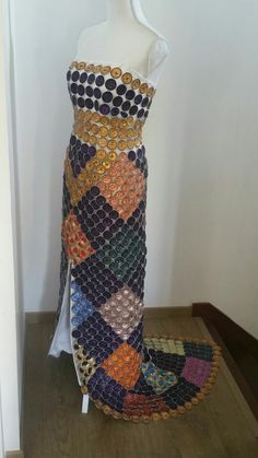 a dress made out of buttons and sequins