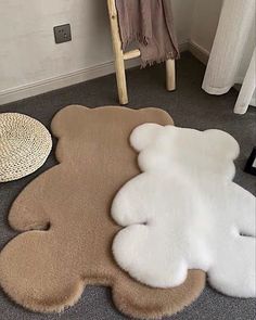 a teddy bear rug on the floor next to a chair