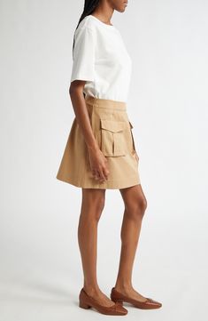 Take the guesswork out of getting dressed with this mixed-media mini fashioned with a soft white T-shirt over a structured A-line cargo skirt. Fronted with capacious bellows pockets, this one-and-done piece will take you anywhere. 34" length Hidden side-zip closure Boat neck Short sleeves Front flap-bellows pockets 100% cotton Dry clean Imported Crochet Sleeveless Sweater, Tassel Crochet, Mixed Media Dress, Swimsuit Cover Up Dress, Red Summer Dresses, Getting Dressed, Cargo Skirt, Bellows, Veronica Beard