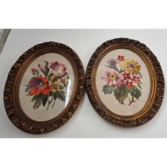 two framed pictures with flowers on them