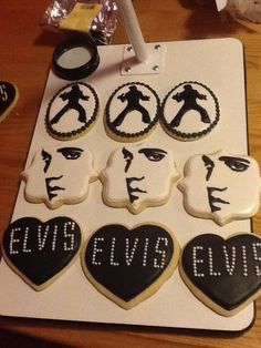 decorated cookies with elvis presley on them are arranged in the shape of heart - shaped cutouts