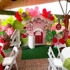 an outdoor party with balloons and decorations