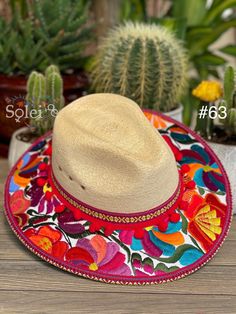 This beautiful Mexican Fedora is made out of Palm and has beautiful embroidered flowers. It is perfect to add that special touch to any outfit. The hat itself is made out of Palm and is very light and breathable. Find more colors here: https://www.etsy.com/es/listing/1002472377/sombrero-mexicano-de-palma-sombrero?ref=listing_published_alert Bohemian Embroidered Sun Hat For Vacation, Bohemian Embroidered Hats For Vacation, Traditional Curved Brim Straw Hat For Spring, Multicolor Embroidered Brimmed Hat, Summer Festival Hat With Floral Embroidery, Bohemian Embroidered Sun Hat For Spring, Floral Embroidered Hats For Summer Festival, Bohemian Embroidered Summer Hat, Floral Embroidery Hats For Summer Festival