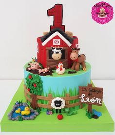 a birthday cake with farm animals on it