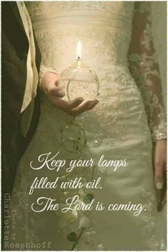 a person holding a candle in their hand with the words keep your lamps filled with oil