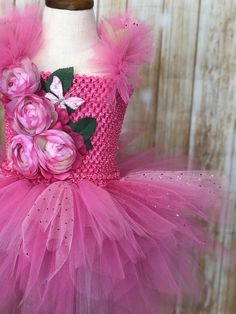 FREE SHIPPING on all orders within the US, no coupon code needed! Fairy Tutu Dress by Little Ladybug Tutus. Handmade Tutus for girls specializing in birthday party dresses, Halloween costumes, flower girl dresses, pageant tutus, 1st birthday tutus, and blinged Converse sneakers. We accept custom orders! ORDER PRODUCTION TIME Please check the top of our website's home page for current turn around time. Since all items are handmade at the time of purchase, there is a production time that varies. W Pink Fitted Fairytale Fairy Dress, Pink Tulle Fairycore Dress, Pink Fairycore Dress With Tulle Material, Pink Fairy Dress With Ruffles, Fairy Style Pink Princess Dress For Dress-up, Pink Fairy Dress For Pageant, Pink Fairy Tutu Dress For Birthday, Whimsical Tutu Dress For Dress-up, Pink Fairy Style Tutu Dress With Ruffles