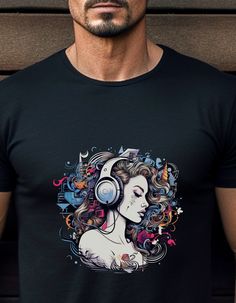 ✨ Enjoy the effortless blend of style and comfort with our Surround T-Shirt, showcasing a unique design of a girl with headphones. Crafted from 100% ring-spun cotton, this tee promises a soft touch against your skin, ensuring utmost comfort for day-long wear, whether you're out and about or simply lounging at home. ✨ With a splash of trendy charm, start your day wearing our Surround T-Shirt, featuring an eye-catching design of a girl with headphones. This breathable, lightweight shirt is perfect for both men and women and can be worn for casual outings, the gym, or as the ideal base layer during the colder months. ✅ FEATURES: ⦿ Suitable for both men and women ⦿ Available in a range of sizes and colors ⦿ Made from 100% ring-spun cotton material ⦿ Breathable and lightweight fabric for comfor Black Graphic Design T-shirt For Music Festival, Black Music-themed Graphic Tops, Black Music-themed Graphic Top, Short Sleeve T-shirt With Sublimation Print For Music Festival, Trendy Concert T-shirt With Sublimation Print, Music-themed Graphic Crew Neck Top, Music-themed Concert Tops With Graphic Design, Music-themed Graphic Tops For Concerts, Music-themed Graphic Top For Concert