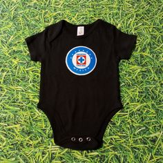 Club Cruz Azul Cotton Onesie Black Casual Onesie With Graphic Print, Black Cotton Tops For Playwear, Casual Short Sleeve Onesie With Graphic Print, Unisex Casual Onesie For Playwear, Black Short Sleeve Onesie For Playwear, Black Short Sleeve Onesie For Summer, Fitted Casual Onesie For Playtime, Casual Fitted Onesie For Playtime, Casual Playwear Onesie