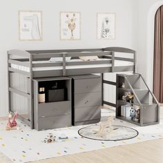 a child's loft bed with stairs and storage drawers