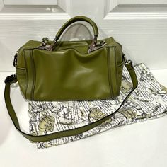 Barr + Barr New York Leather Satchel Handbag Purse - Green W/ Silver Hardware Features: Adjustable Shoulder Strap. Made With Genuine Leather. Color - Green With Silver Hardware Dimensions - 12"L X 7"H X 6"D Condition: Excellent, Brand New Condition! Never Worn. Dust Bag Included. Designer Green Satchel With Palladium Hardware, Green Rectangular Satchel With Silver-tone Hardware, Green Satchel With Silver-tone Hardware And Double Handle, Chic Green Satchel With Silver-tone Hardware, Green Satchel With Palladium Hardware And Top Handle, Green Satchel With Palladium Hardware, Green Satchel Bag With Silver-tone Hardware, Green Satchel With Silver-tone Hardware For Daily Use, Green Shoulder Bag With Palladium Hardware