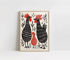 two chickens standing next to each other in front of a white wall