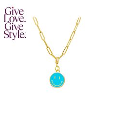 a gold chain with a blue smiley face on it and the words give love, give style