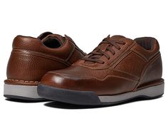 Rockport ProWalker M7100 - Men's Shoes : Bridle Brown : The Rockport Prowalker M7100 lace-up sneaker proves that there is a difference with walking shoes and walking comfort. Genuine full grain leather uppers are easy to clean and maintain for extended wear. Walk for miles without tiring your feet and get that blister-free comfort in the Rockport M7100 Prowalker Walking Shoes. Leather upper with padded tongue and collar. Padded tongue and collar prevents blisters and lace bruising for continuous Slip-resistant Lace-up Walking Shoes For Errands, Leather Slip-resistant Sneakers For Outdoor, Moc Toe Sneakers With Cushioned Footbed For Outdoor Activities, Walking Shoes With Rubber Sole For Errands, Walking Shoes With Ortholite Insole, Leather Walking Shoes With Vibram Sole For Sports, Leather Walking Shoes With Ortholite Insole For Errands, Comfortable Moc Toe Walking Sneakers, Rugged Lace-up Walking Shoes With Ortholite Insole