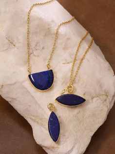 Bohemian Lapis Lazuli pendant necklace in gold plated brass. Suitable for both men and women. Various shapes available. Statement Lapis necklace with adjustable chain length. Durable gold plating, anti-tarnish, non-allergic. Gold Lapis Lazuli Spiritual Necklace, Gold-plated Necklaces With Natural Stones For Gift, Spiritual Gold Plated Necklaces With Natural Stones, Brass Necklaces With Gemstone Round Pendant, Brass Gemstone Necklace With Round Pendant, Brass Necklace With Round Gemstone Pendant, Blue Brass Amulet Necklace, Gold Plated Natural Stones Pendant Jewelry, Yellow Gold Amulet Necklace With Natural Stones