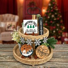 a wooden tray with christmas treats on it