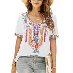 PRICES MAY VARY. 【 Floral Embroidered】Traditional Ethnic Style floral pattern embroidered on this boho tops for women summer，exquisite and elegant design, soft and lightweight fabric with excellent comfort. 【 Features】-- This blouse belong to our new spring summer mexican peasant blouses series. The embroided blouses for women short sleeve shirts is with bohemian floral embroidered around neckline, bottom and shoulder,The unique Mexican peasant embroidered top makes you look special among the cr Embroidery Tops For Women, Mexican Peasant Blouse, Traditional Boho, Embroidered Tops, Boho Mode, Peasant Shirt, Hippie Clothes, Short Sleeve Shirt Women, Bohemian Tops