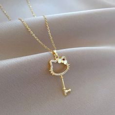 The perfect statement piece for every H ello Kitty lover. This beautiful gold plated necklaces is made from stainless steel!   Pendant Size: 3.8cmx1.8cm Necklace Size: 40+5cm Cute Gold Metal Necklace, Cute Gold Chain Jewelry, Cute Gold Jewelry With Cat Design, Cute Gold Necklace With Cat Design, Kitty Necklace, Cat Necklace, Necklace Size, Steel Necklace, Gold Plated Necklace