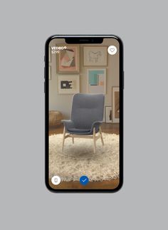 an iphone with the home screen showing a blue chair on top of a white rug