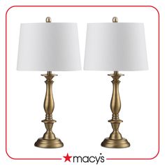 two lamps are shown side by side, one is gold and the other is white