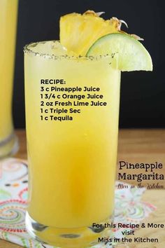 the recipe for pineapple juice is in a glass with a lime slice on top