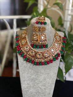 Gorgeous gold plated. Beautiful and elegant Kundan and Meenakari Necklace Perfect for Indian weddings. Size- Adjustable Premium Quality and High craftsmanship Gorgeous 24 K gold plated. All the raw material used in this product is of high quality and is handcrafted with love. Premium Quality and High craftsmanship 100% Satisfaction Guarantee: Long Lasting Plating, High-Quality Stones. Gifting: This pair of charming necklace and earrings come in a beautiful gift box, making it an ideal gift for b Kundan Necklaces, Wedding Jewelry Sets, Beautiful Gift Boxes, Indian Wedding, Ideal Gift, Jewelry Sets, Wedding Jewelry, Statement Necklace, Plating