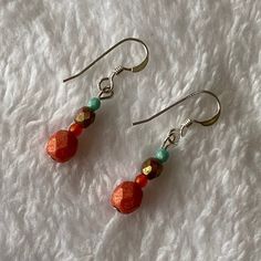 Minimalist drop earrings are perfect for the summer! Vibrant colors of pink, bronze, orange and turquoise. They are made with sterling silver and Czech glass beads. App. 1.5 in" long. Thanks for visiting our shop! Colorful Beaded Copper Earrings Gift, Everyday Hypoallergenic Orange Jewelry, Nickel Free Orange Earrings For Everyday, Nickel-free Orange Earrings For Everyday Wear, Everyday Hypoallergenic Orange Earrings, Orange Dangle Earrings Minimalist Style, Orange Minimalist Dangle Jewelry, Minimalist Orange Dangle Jewelry, Orange Faceted Beads Dangle Earrings