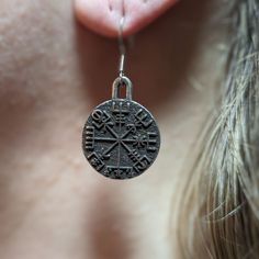 Vegvisir bronze earrings Embrace the mystique of ancient Norse mythology with our Vegvisir Earrings, inspired by the legendary Viking compass. Crafted with meticulous attention to detail, these earrings capture the essence of Norse symbolism and pagan tradition.The Vegvisir, also known as the Viking compass, is a powerful symbol of guidance and protection. Believed to lead travelers safely through rough seas and unknown lands, it embodies the spirit of adventure and exploration.Made from solid b Vegvisir Symbol, Viking Accessories, Greek Mythology Jewelry, Nordic Jewelry, Mythology Jewelry, Ancient Runes, Mjolnir Pendant, Rough Seas, Norse Jewelry