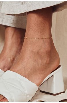 Elevate your everyday looks with a delicate chain anklet playfully punctuated with flattened links for a subtle dimensional twist. 9 1/4" length 14k-gold fill Made in the USA Gold Anklet, Delicate Chain, Chain Anklet, Anklet Jewelry, Pure Gold, Pretty Jewellery, Cute Jewelry, Everyday Look, Gold Chains