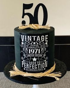 a 50th birthday cake with the number fifty on it