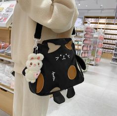 Lovely Cat Shoulder Bag PN5881 ●Size:34*30*9cm ●Material :nylon (Please allow 1-3cm differs due to manual measurement.As different computers display colors differently,the color of the actual may vary slightly from the above images.Thanks for your understanding.) ●About Shipping: We attach great importance to the orders of each customer and parcel delivery. 1.Processing time: 2-3 business days. 2.Shipping time: 10-15 business days to US, please allow 3-4 weeks shipping to other country.(Shipping times can be affected by variable customs clearance times or public holidays.) Anime Shoulder, Kitty Paws, 80 Fashion, Rabbit Charm, Cartoon Bag, Lovely Cat, Beige Bag, Fleece Dress, Bag Cute