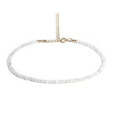 White Moonstone anklet, delicate perfect for layering. One size fits all Adjustable Genuine, luxurious gemstones guaranteed. 14k Gold-filled, it won't tarnish. SIZING and MEASUREMENTS: Bead size: 3mm One size adjustable: fits sizes 8 1/2 inches to 10 1/2 inches. The model is wearing it at 8.5 in. Moonstone is a powerful stone, that helps the wearer connect to his/her intuition to make better decisions. It is a stone associated with love and abundance. Luxury White Gemstone Beads Necklace, Delicate White Anklet As A Gift, Delicate White Adjustable Anklets, White Moonstone, Moonstone Beads, Cool Things To Make, One Size Fits All, Anklets, Moonstone