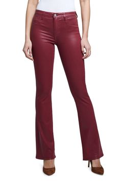 A flattering high waist and flared legs lend retro-inspired vibes to these shapely pants finished with a shiny coating. 34" inseam; 18" leg opening; 10 1/2" front rise; 14" back rise (size 29) 86% cotton, 11% elastane, 3% spandex Spot clean Made in the USA of imported fabric Boot Jeans, Baby Boots, Tag Sale, Retro Inspired, Jeans Pants, Jeans And Boots, Lady In Red, Leather Pants, High Waist