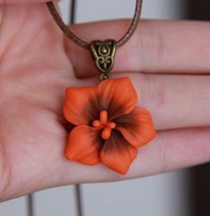 Burnt orange statement necklace Hibiscus necklace pendant | Etsy Handmade Polymer Clay Flower Pendant Jewelry, Handmade Polymer Clay Jewelry With Flower Pendant, Handmade Orange Resin Necklace, Handmade Orange Flower-shaped Jewelry, Unique Orange Flower Shaped Jewelry, Unique Orange Flower-shaped Jewelry, Orange Flower Pendant Jewelry Gift, Orange Flower Pendant Jewelry For Gift, Handmade Clay Flower Jewelry