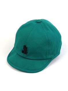 a green hat with a black logo on it