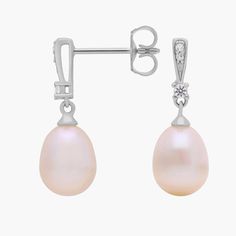 These classic Freshwater cultured pearl drop earrings go from wedding to work with ease. Demurely styled white drop pearls are accented with subtly glittering white topaz gemstones set in sterling silver. This beautiful pair of pearl earrings features a secure post closure and they make a versatile bridesmaid gift for your besties. Blue Nile, Topaz Gemstone, Pearl Drop Earrings, Pearl Drop, White Topaz, Bridesmaid Gift, Bridesmaid Gifts, Sterling Silver Earrings, Fresh Water