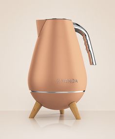 an electric tea kettle with wooden legs on a white surface and the words adnaviz written on it