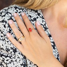 The Story A vintage ring made in 14 karat yellow gold with a great center stone. It features an orangish-red coral cabochon measuring approximately 12 mm x 8 mm. The coral is bezel set in a thin gold setting with a decorate detail on the band giving the ring dimension and interest. It glides on the finger and adds the perfect amount of color to your jewelry wardrobe. The Specs Style number: R1165 Vintage, circa mid-late 20th century 14k yellow gold Coral 12 mm x 8 mm approximately Height of fron Pagadam Rings, Kundan Kada, Coral Rings, Aqeeq Ring, Tape Nail Art, Opal Ring Vintage