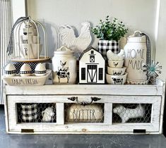 an old drawer is decorated with farm animals and farmhouse decor