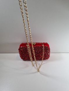 A stunning clutch purse in a beautiful deep red. A statement piece that will make any outfit. You will fall in love at first sight! Red Embellished Evening Bag, Elegant Red Embellished Evening Bag, Red Embellished Clutch For Formal Occasions, Elegant Burgundy Clutch For Formal Occasions, Red Embellished Clutch As Gift, Burgundy Clutch Evening Bag For Formal Occasions, Chic Burgundy Evening Bag For Party, Elegant Burgundy Evening Bag, Red Clutch Bag With Rhinestones