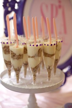 small desserts are arranged on a cake plate